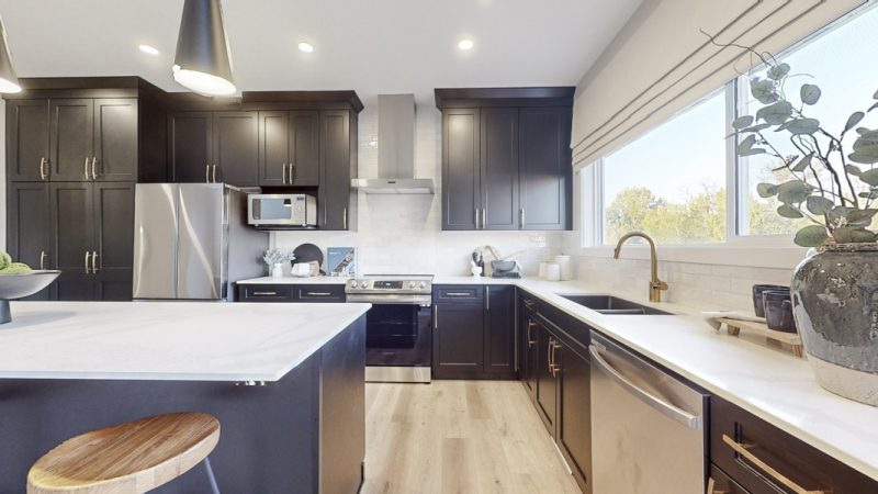 Kitchen in Sterling Home's Atlas Showhome in Kinglet by Big Lake
