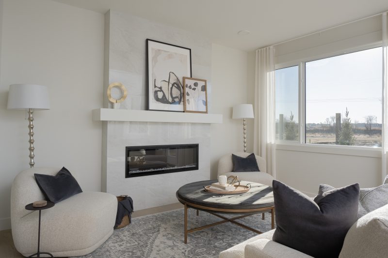 Main floor living room in Anthem's front drive 120 showhome in Kinglet by Big Lake