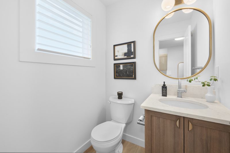 Powder room in Streetside's Harlow Townhome Showhome in Kinglet by Big Lake
