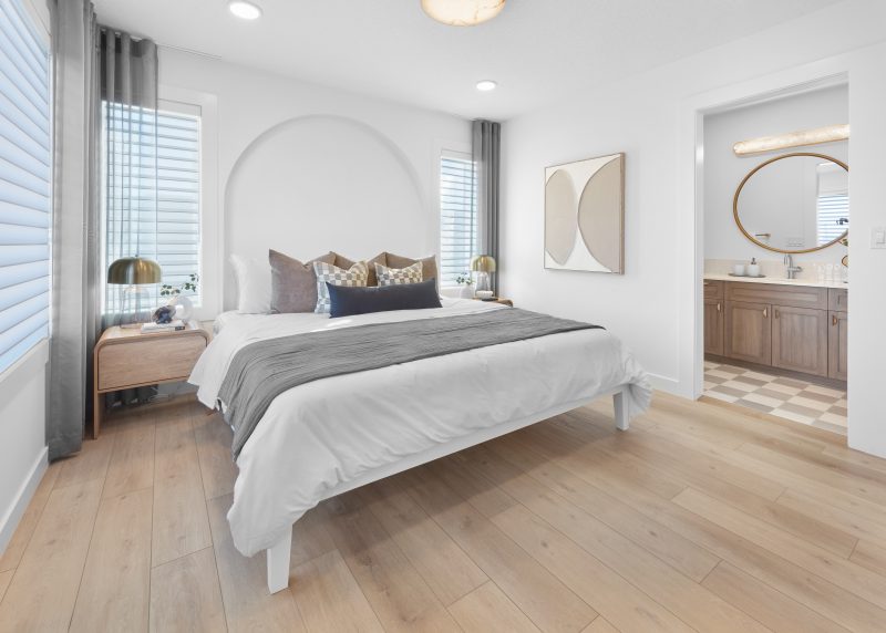 Primary bedroom in Streetside's Harlow Townhome Showhome in Kinglet by Big Lake